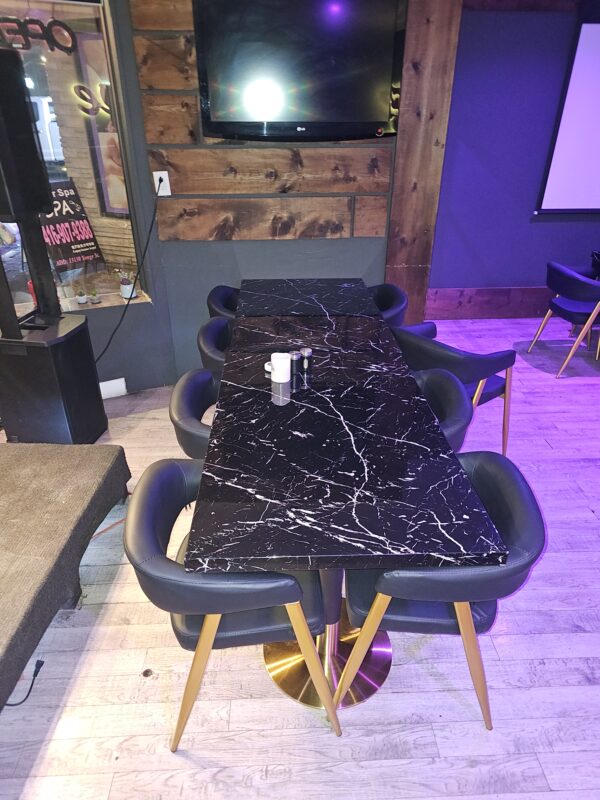 Black restaurant chair with faux marble restaurant table