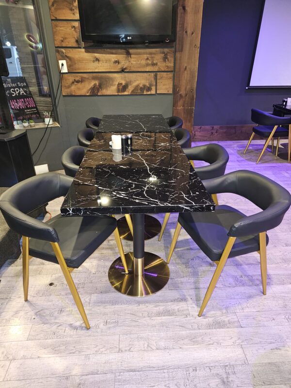 Black restaurant chair with faux marble restaurant table